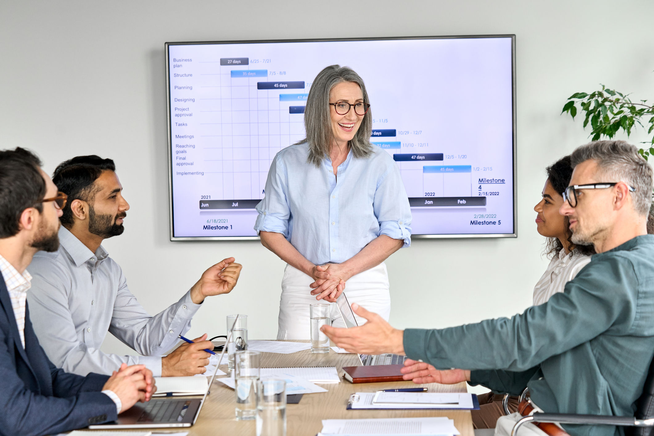 Female executive presenting to a group