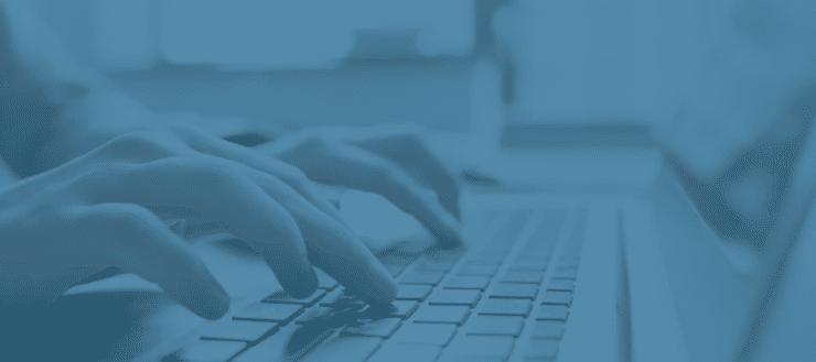 Typing at computer with blue overlay blog category header image
